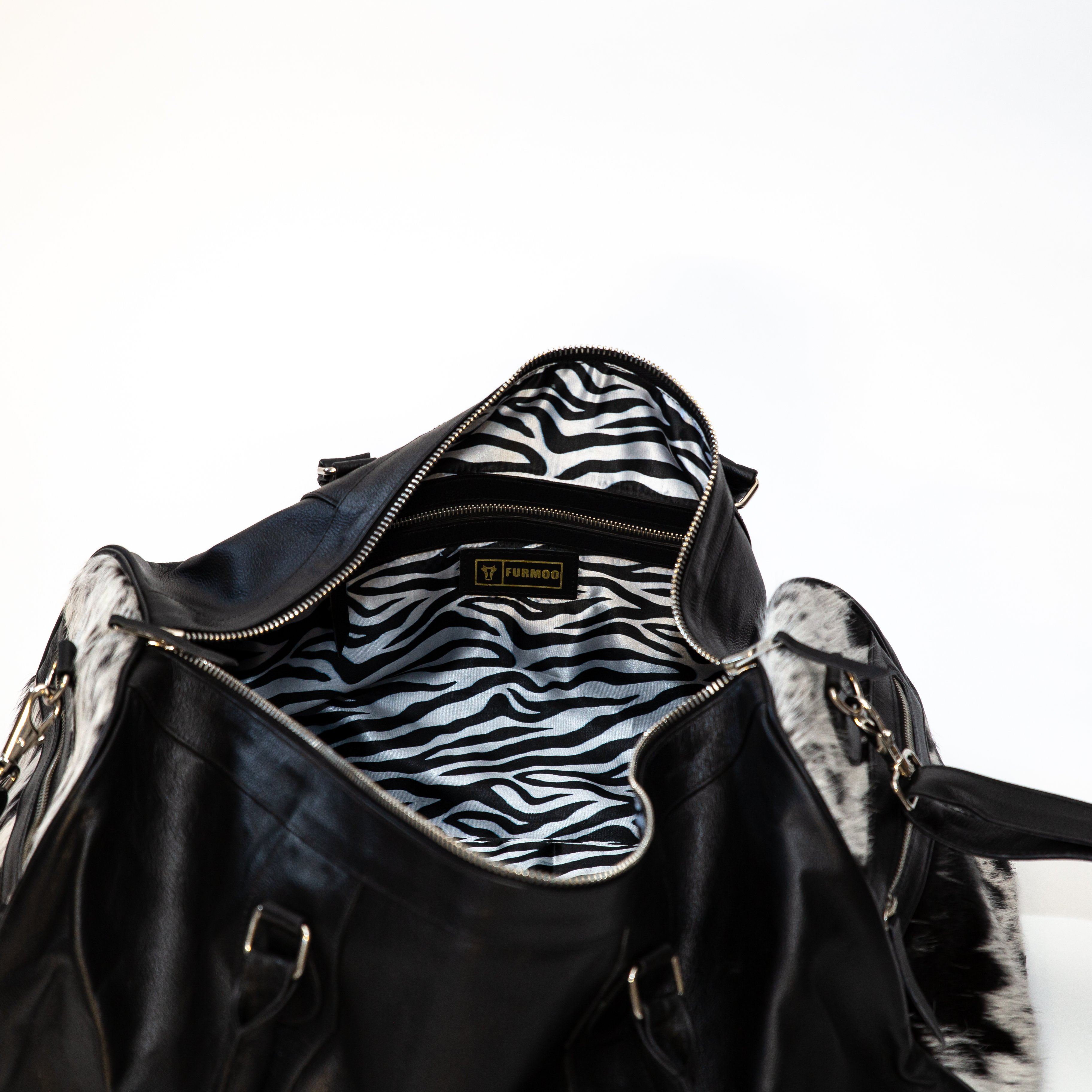 Bree Cowhide Travel Bag