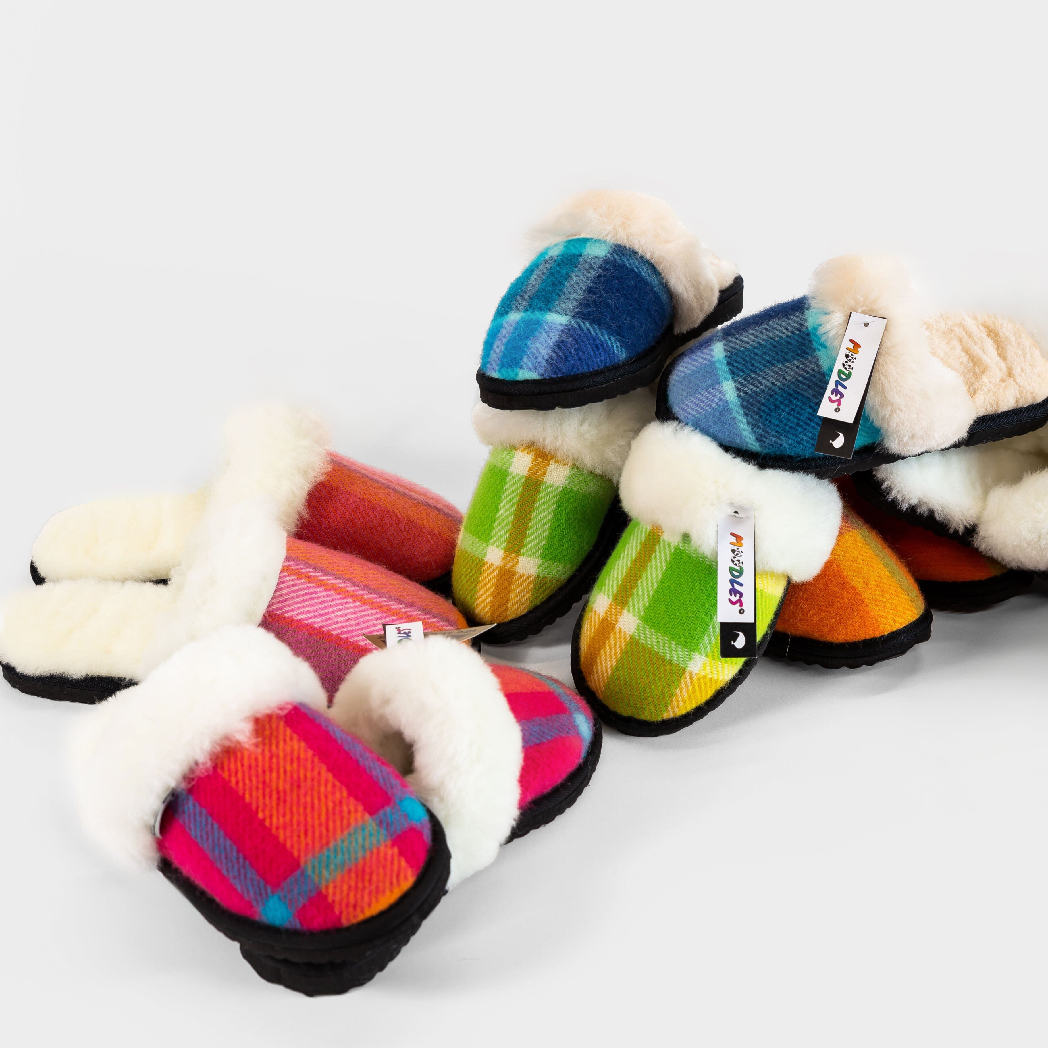 Tartan slippers with hot sale pom poms