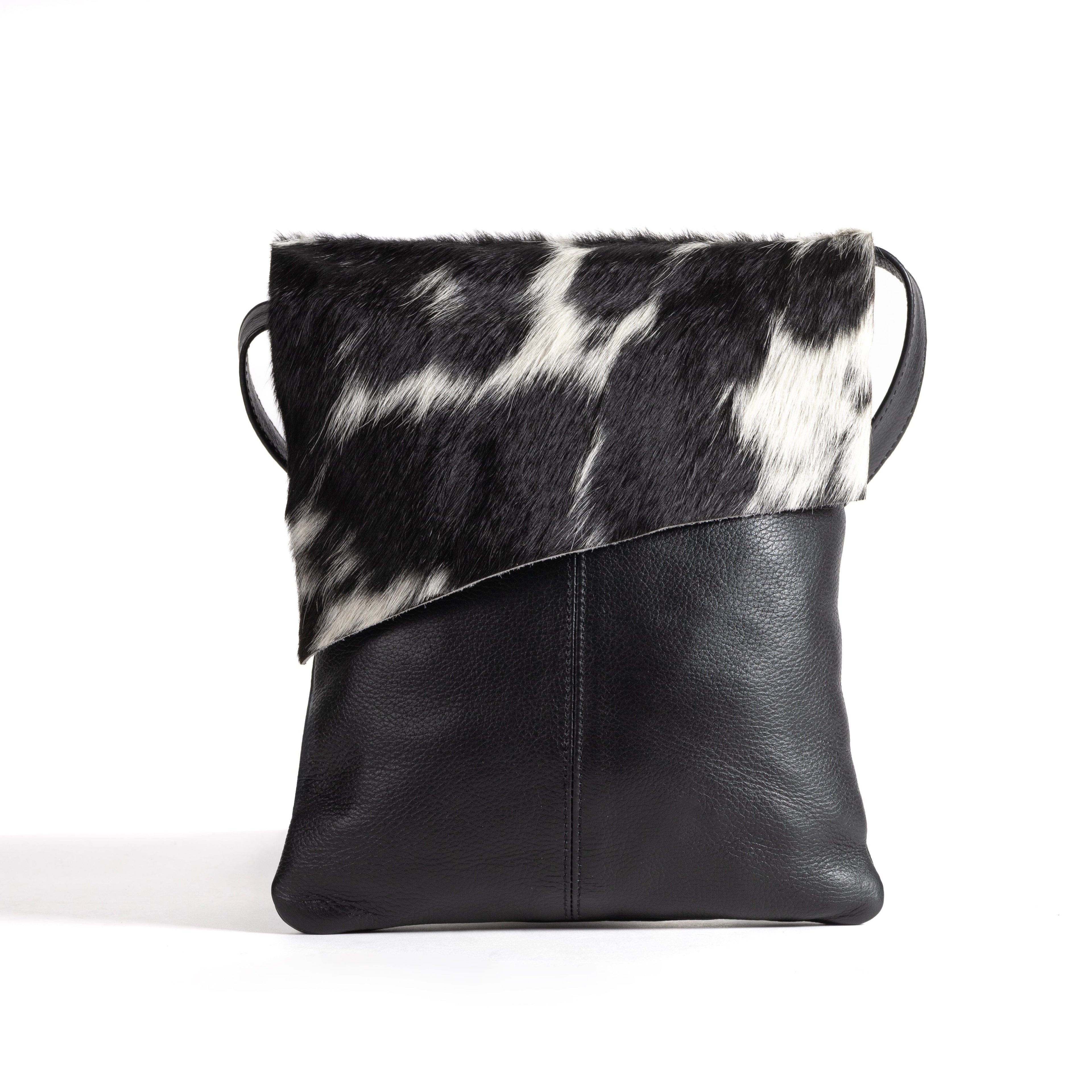 Mini Raw Cut Cowhide Handbag steal of a deal ! ( Free keyring and passport protector valued over $100)