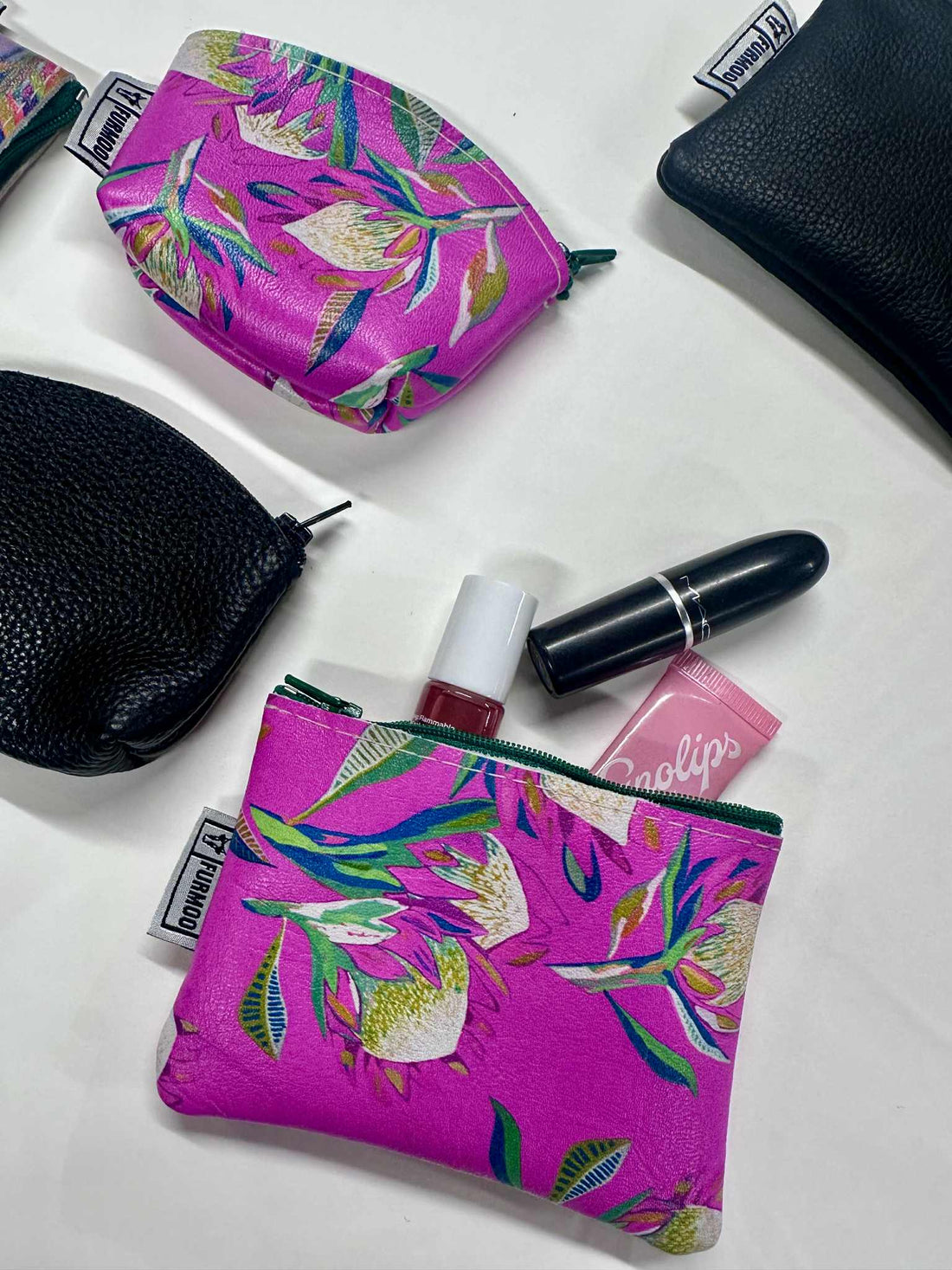 You Could Win a Gucci Bag with Every NZ-Made Coin Purse Purchase!