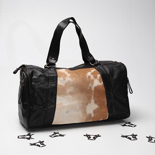 The Tan Black Traveller